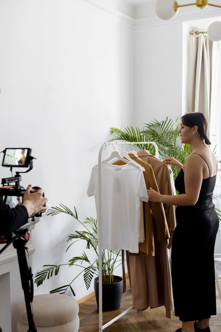 A creator filming a local boutique for CLocal
